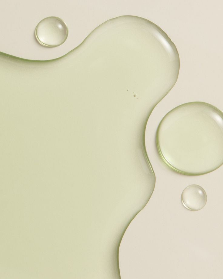 SOWN serum droplets on a pale sage surface